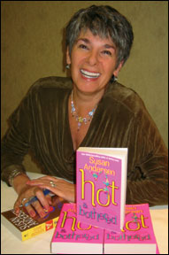 Susan signs books